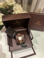 ساعة اقنر ذهبي