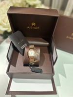 ساعة اقنر ذهبي