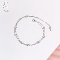 خلخال بتصميم فصوص مطلي فضي