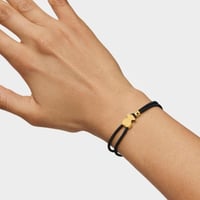 توس - سوار مطاطي باللون الأسود