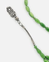 مسباح رجالي بلون أخضر وبأحجار الفاترون