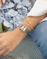 ساعة عنان النسائية بلون فضي وذهبي