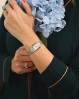 ساعة ريوف النسائية باللون الذهبي والفضي