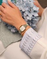 ساعة النجوى النسائية باللون الذهبي والفضي