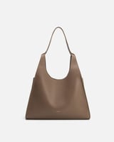 شنطة نسائية من الجلد بلون بني فاتح