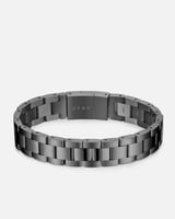 إسورة من المعدن بلون رمادي بتصميم عصري