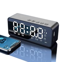 منبه مع مكبر صوت لاسلكي مع راديو Fm، بجانب السرير...