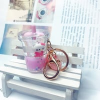 سلسلة مفاتيح شكل المشروبات الغازية و الهيلو كيتي م...