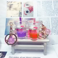 سلسلة مفاتيح شكل المشروبات الغازية و الهيلو كيتي م...