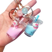 سلسلة مفاتيح شكل المشروبات الغازية و الهيلو كيتي م...