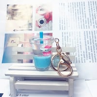 سلسلة مفاتيح شكل المشروبات الغازية و الهيلو كيتي م...