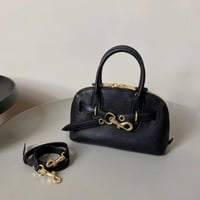 ميو ميو | أسود