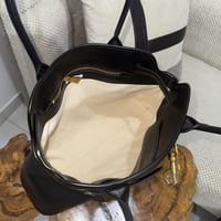 ميو ميو | أسود