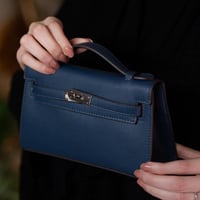 كيلي بوشيت | أزرق