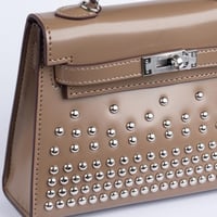 ميني كيلي | كاكي