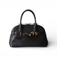 ميو ميو | أسود