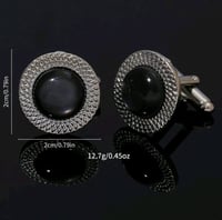 كبك فضي على اسود شكل دائري