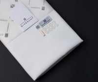 قماش جيفنشي صيفي كريمي ابيض أو ياباني نص واقف