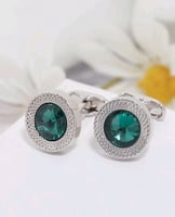 كبك فضي على ازرق شكل دائري