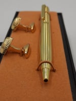 طقم قلم وكبك لون ذهبي