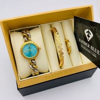 طقم نسائي ماركة فندربلو ذهبي على ازرق