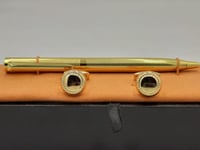 طقم قلم وكبك لون ذهبي