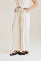 بنطلون بأرجل واسعة بكسرات