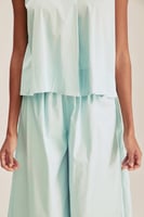 بلوزة بلاأكمام مزينه بأربطة