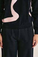 كنزة مزينة بالترتر