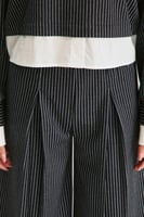 بلوزة مقلمة بقصة فضفاضة