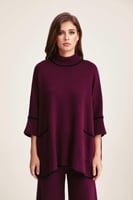 بلوزة واسعة بجيوب