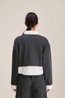 بلوزة مقلمة بقصة فضفاضة