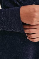 فستان لامع بتفاصيل مزمومة