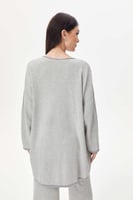 بلوزة واسعة بنقوش متعرجة