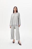 بلوزة واسعة بنقوش متعرجة