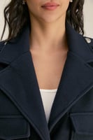 معطف بلا أكمام بجيوب قلاب