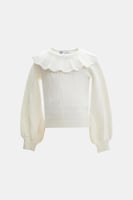 بلوزة محبوكة بياقة كشكش