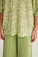 بلوزة محبوكة مزينة بنقوش