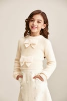 بلوزة محبوكة مزينة بفيونكة