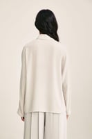 قميص واسع بكسرات