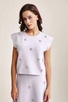 بلوزة مزينة بكريستالات