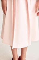 تنورة سادة بكسرات