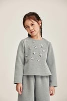 بلوزة مزينة بالكريستال