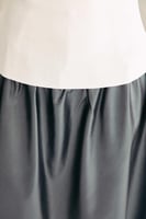 بلوزة مزينة بعقدة