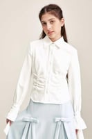 قميص بأكمام بأربطة