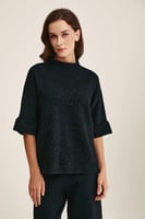 بلوزة واسعة بنقوش مموجة