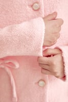 جاكيت صوف مزين بفيونكات