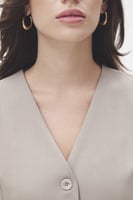 جاكيت بلا أكمام بازرار