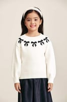 كنزة مزينة بفيونكات لامعة