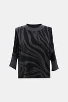 بلوزة مزينة بنقوش مموجة